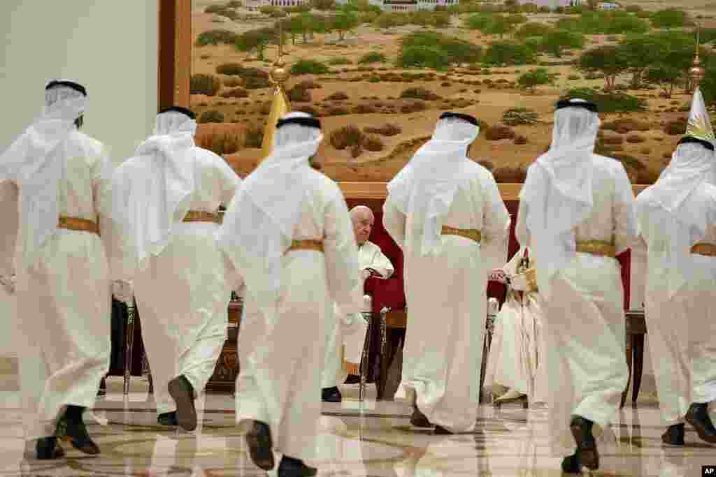 Pope Francis talks with Bahrain&#39;s King Hamad bin Isa Al Khalifa as he arrives at the Sakhir Air Base, Bahrain. Pope Francis is making the November 3-6 visit to participate in a government-sponsored conference on East-West dialogue and to minister to Bahrain&#39;s tiny Catholic community, part of his effort to pursue dialogue with the Muslim world.&nbsp;