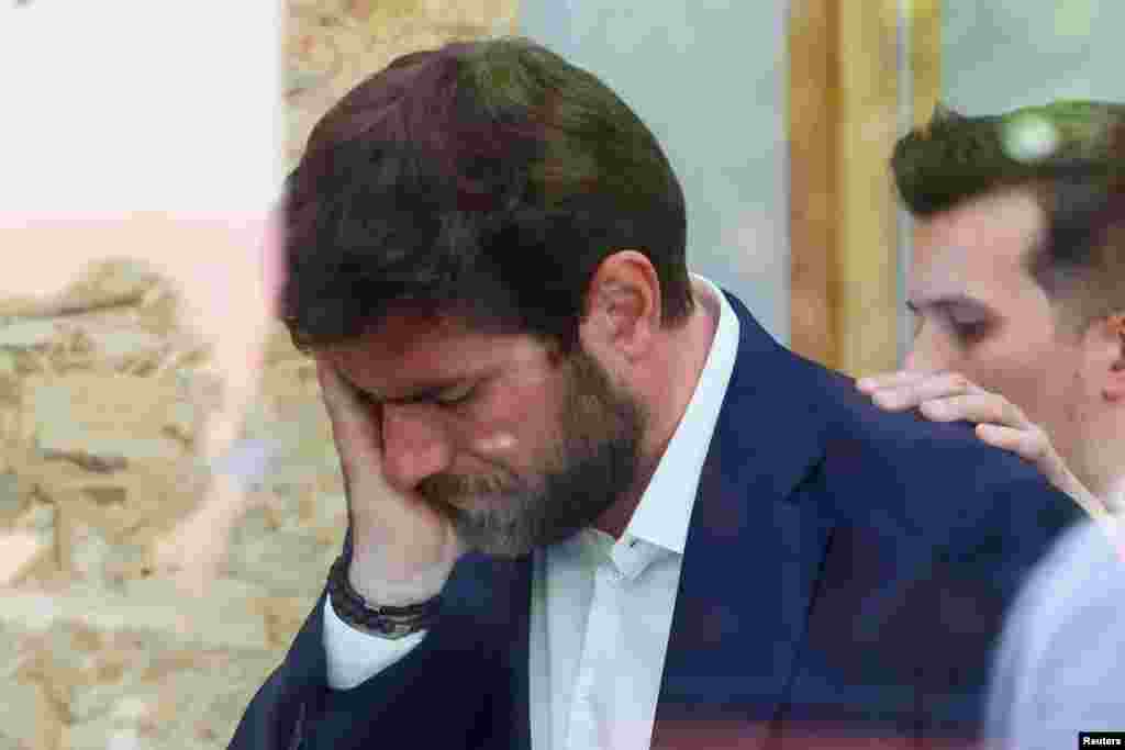 L&#39;Hay-les-Roses mayor Vincent Jeanbrun reacts at the city hall in L&#39;Hay-les-Roses, where his home was ram-raided and set alight, while his wife and children were asleep inside, during the unrest, following the death of Nahel, a 17-year-old teenager killed by a French police officer in Nanterre during a traffic stop, in L&#39;Hay-les-Roses near Paris, France.