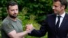 Ukraine President Volodymyr Zelenskyy, left, and France's President Emmanuel Macron (File Photo)