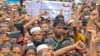 উখিয়ায় গণহত্যা দিবসের ষষ্ঠ বার্ষিকী উপলক্ষে একটি সমাবেশের জন্য জড়ো হয়েছে রোহিঙ্গা শরণার্থীরা। ২৫ আগস্ট, ২০২৩। 