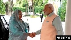 ভারতের প্রধানমন্ত্রী নরেন্দ্র মোদী এবং বাংলাদেশের প্রধানমন্ত্রী শেখ হাসিনা। জি-২০ সামিট, ভারত, ২০২৩।