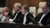 နယ်သာလန်နိုင်ငံ The Hague မြို့မှာရှိတဲ့ ICJ နိုင်ငံတကာတရားရုံးမှာ တောင်အာဖရိကနိုင်ငံက အစ္စရေးကို လူမျိုးတုန်းသတ်ဖြတ်မှု စွပ်စွဲချက်နဲ့ပတ်သက်လို့ ကြားနာပွဲအတွင်းတွေ့ရတဲ့ ICJ ဂျူရီလူကြီးမင်းများ (ဇန်နဝါရီ ၂၆၊ ၂၀၂၄)