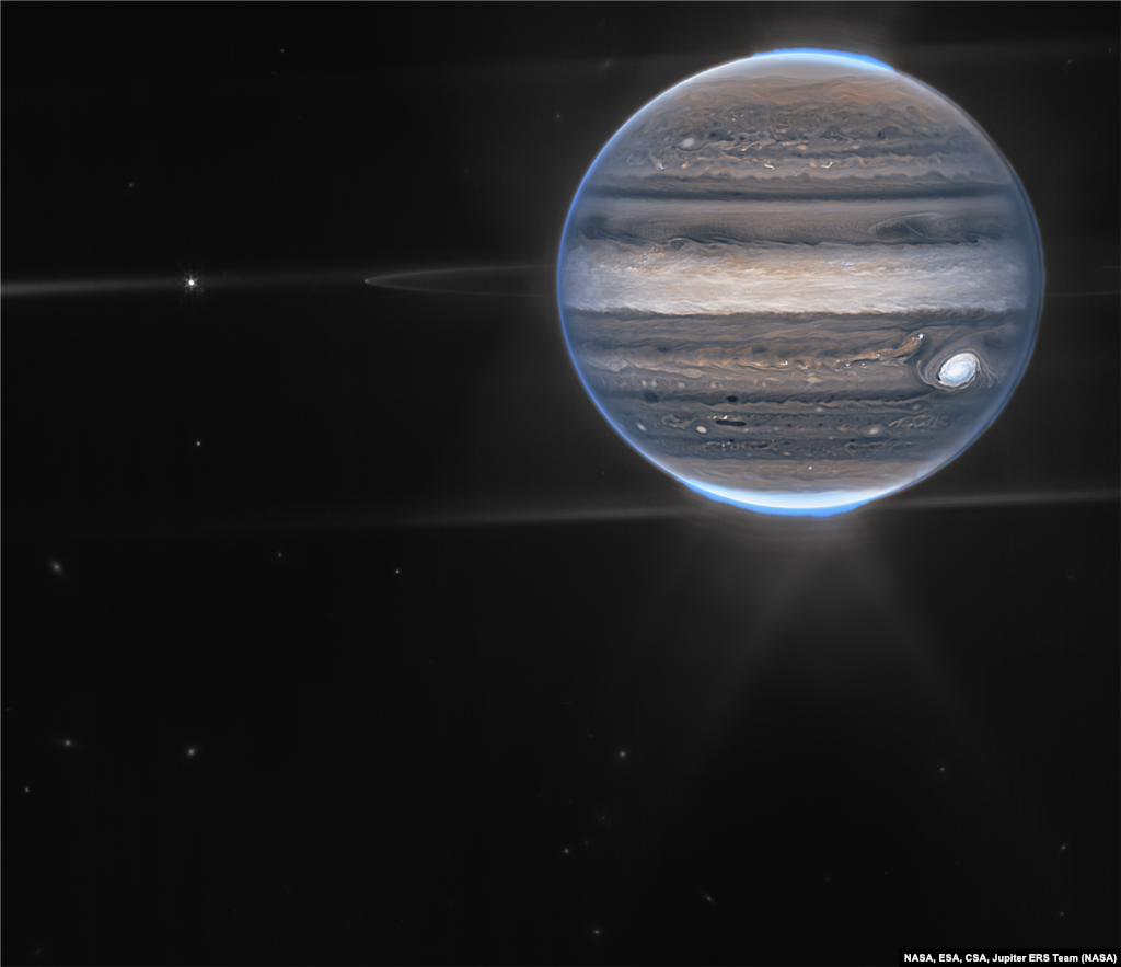 NASA&rsquo;s James Webb Space Telescope captures new images of Jupiter showcasing auroras and hazes. Webb sees Jupiter with its faint rings, which are a million times fainter than the planet, and two tiny moons called Amalthea and Adrastea. (image processing by Ricardo Hueso (UPV/EHU) and Judy Schmidt)