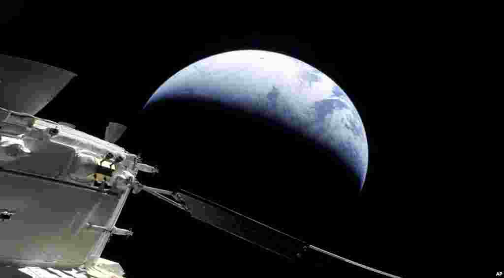 This image provided by NASA shows the Orion spacecraft approaching Earth as it neared the end of its three-week test flight to the moon.&nbsp;