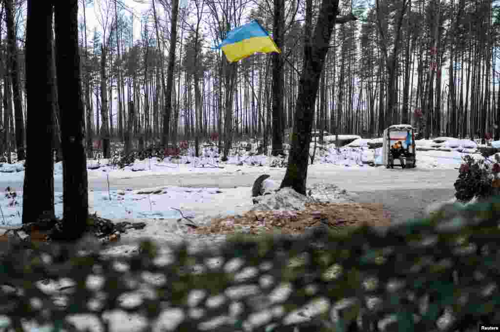 A Ukrainian service member is seen at a position near the border with Belarus, in Zhytomyr region amid Russia&#39;s attack on Ukraine, Dec. 27, 2022.