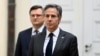 US Secretary of State Antony Blinken stands close to Ukrainian Foreign Minister Dmytro Kuleba as they meet with the Foreign Ministers of the G7 Nations on the sidelines of the Munich Security Conference (MSC) in Munich, Germany, February 19, 2022.