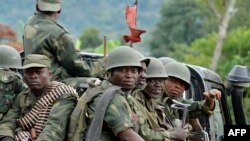 Wanajeshi wa DRC wakishika doria karibu na mlima Mbuzi, Rutshuru. wanajeshi hao wanapambana na waasi wa M23. PICHA: AFP