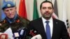 El primer ministro libanés Saad Hariri culpa a Irán por su renuncia. En esta foto de archivo, él a la derecha, en la sede de las fuerzas de paz de la ONU, en Naqoura, al sur del Líbano.