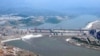 2003年6月3日的三峽大坝。三峡工程和三峡集团一再处于舆论的风口浪尖上