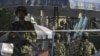 中国指责穆斯林极端分子在咯什进行恐怖袭击，警方2011年8月1日加强在乌鲁木齐的警戒