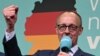 เฟรดดริค แมร์ซ สหภาพประชาธิปไตยคริสเตียน (CDU) กล่าวกับผู้สนับสนุนหลังเอ็กซิตโพลล์ชี้ว่าพรรคของเขาคว้าชัยเลือกตั้งทั่วไปเยอรมนี 23 ก.พ. 2025 (Photo by INA FASSBENDER / AFP)